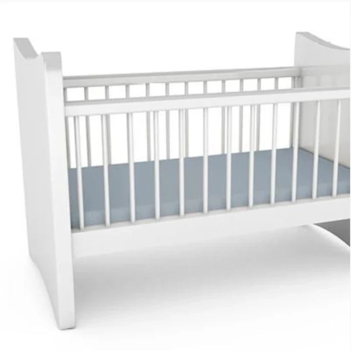 Light Blue bamboo fitted sheet on a white cot