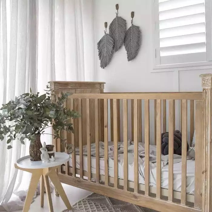 Little Argonaut bamboo cot bed bedding in a nursery